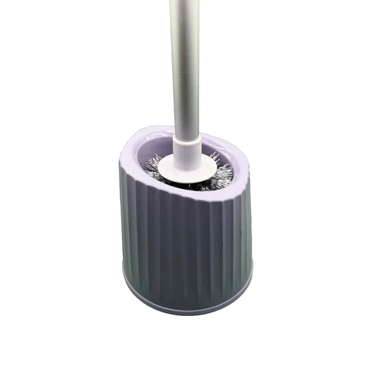 Toilet cleaning brush with reservoir